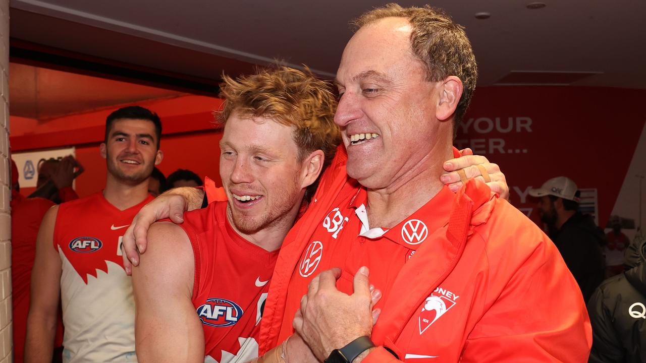 Callum Mills and John Longmire. (Photo by Mark Metcalfe/AFL Photos/via Getty Images)