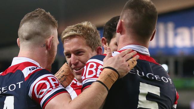 Mitchell Aubusson leads the celebration after Shaun Kenny-Dowall scored a try against the Melbourne Storm at Allianz Stadium. Picture: Mark Kolbe/Getty Images.