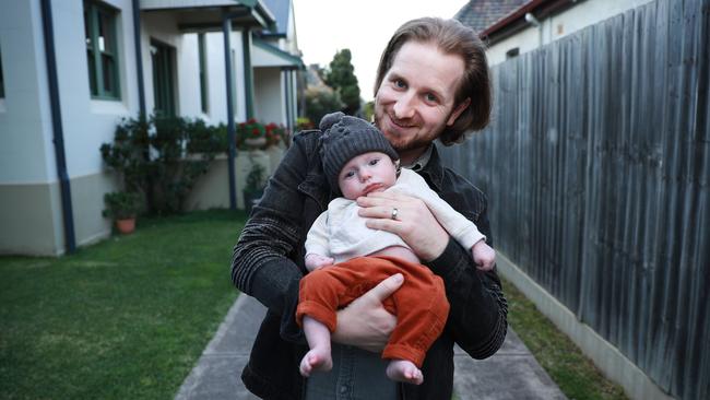 ‘Being prepared to ask people if they are OK is so important,’ says mental health advocate Nic Newling, with his son Finn. Picture: John Feder