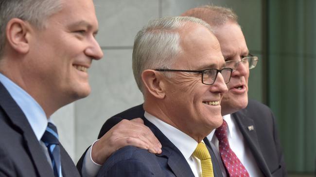 Finance Minister Mathias Cormann and Treasurer Scott Morrison showed their robust support for Prime Minister Malcolm Turnbull on Wednesday. Picture: AFP
