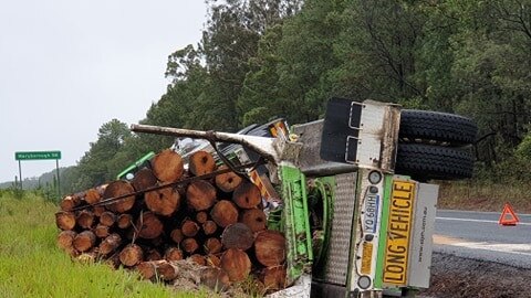 A logging truck rollover on Maryborough Cooloola Rd yesterday.