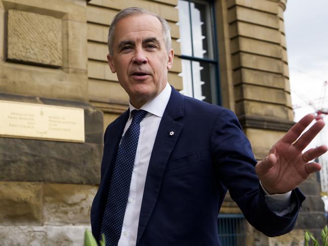Canadian Prime Minister Mark Carney arrives at the Office of the Prime Minister and Privy Council, the morning after the Liberal Party won the Canadian federal election, in Ottawa on Tuesday, April 29, 2025. (Justin Tang/The Canadian Press via AP)