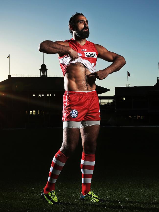 Adam Goodes re-enacts Nicky Winmar’s famous photograph in 2013. Picture: Phil Hillyard