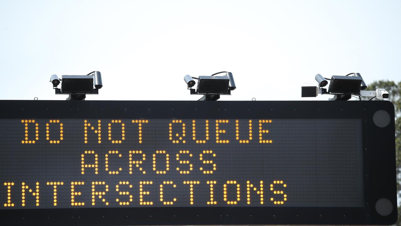 Three of the cameras are pictured fixed to a traffic sign on Anzac Parade at Moore Park near Alison Road. Picture: David Swift.