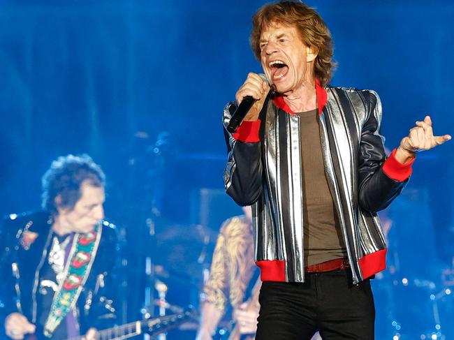 (FILES) In this file photo taken on September 30, 2021 British singer Mick Jagger performs during the Rolling Stones "No Filter" 2021 North American tour at The Dome at America's Center stadium in St. Louis, Missouri. - The Rolling Stones have cut their popular track "Brown Sugar" from their US tour, at least for now, in the wake of criticism over its lyrics referring to slavery. (Photo by Kamil Krzaczynski / AFP)