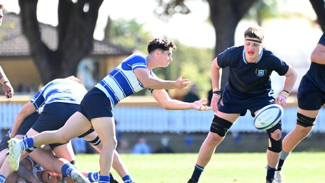 Sam Watson delivers a pass for Nudgee. Picture, John Gass