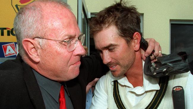 Justin Langer with his father Colin after playing for Australia against Pakistan in 1999. Picture: Leigh Winburn