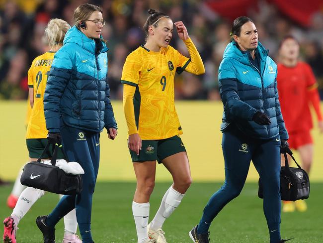 ADELAIDE, AUSTRALIA - MAY 31: Caitlin Foord of Australia taken from the pitch by medical staff during the international friendly match between Australia Matildas and China PR at Adelaide Oval on May 31, 2024 in Adelaide, Australia. (Photo by Sarah Reed/Getty Images)