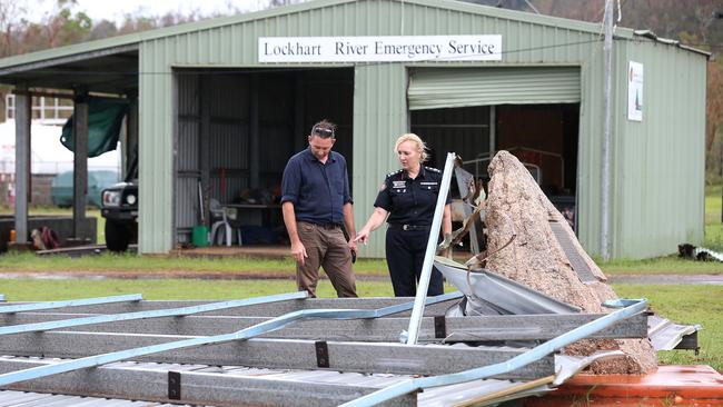 Surveying the damage: Katarina Carroll and Fire and Emergency Services Minister, Craig Crawford, at Lockhart River Airport on Cape York after Cyclone Trevor crossed the coast in 2019.