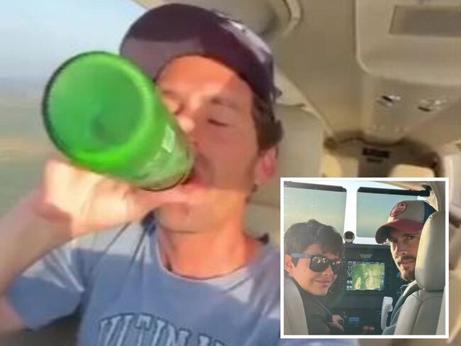 Unsettling footage has emerged of a father downing beer while his young son pilots their plane - not long before the pair were killed in a crash.