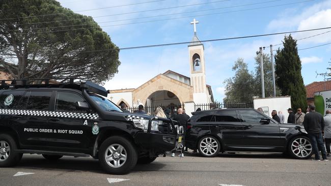 Police patrol the funeral of Fares Abounader. Picture: John Grainger