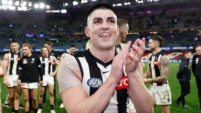 MELBOURNE, AUSTRALIA - JUNE 16: Brayden Maynard of the Magpies celebrates after his 200th match during the 2024 AFL Round 14 match between the North Melbourne Kangaroos and the Collingwood Magpies at Marvel Stadium on June 16, 2024 in Melbourne, Australia. (Photo by Michael Willson/AFL Photos via Getty Images)