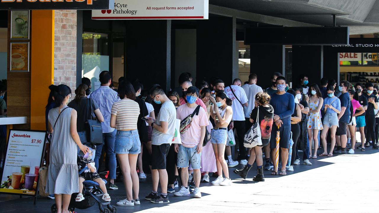 People are seen queuing up at the Walk in Covid-19 Testing Clinic in the CBD in Sydney ahead of Christmas. Picture: NCA Newswire / Gaye Gerard