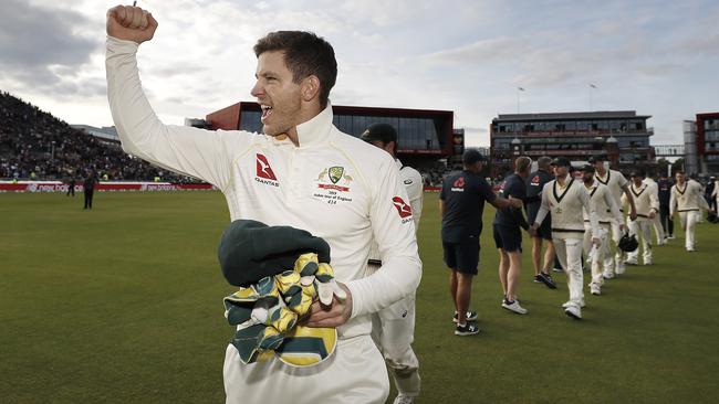 Tim Paine led his triumphant side off the Old Trafford pitch to celebrate hard.