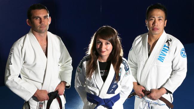 Australian Combat Sports Academy owner Denis Kelly with instructors Sarah de Cata and Phillip Lai. Picture: George Salpigtidis