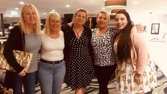 Former Gold Coast resident Robyn Munro (centre) has had to move back to NZ after living in Australia for 14 years because she could not find a job during COVID and isn't entitled to any financial support in Australia. She’s pictured at the Palm Beach Surf Club with friends she’s had to leave behind.