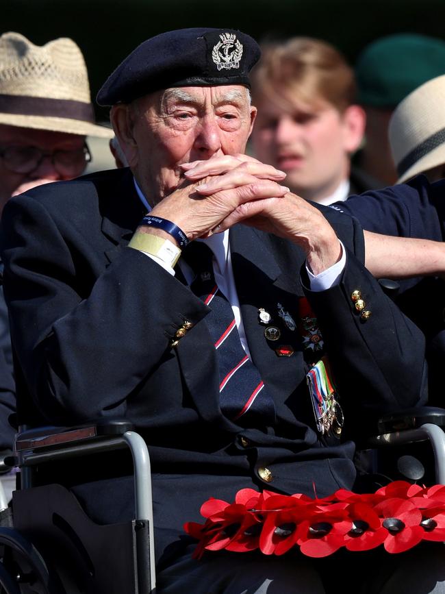 A war veteran reflects during a Royal British Legion service of commemoration at the Bayeux War Cemetery in Normandy, France. Picture: Getty Images.