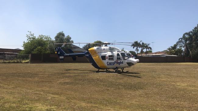 The CareFlight rescue helicopter in a reserve off Himalaya Cres, Seven Hills. Picture: Kate Lockley