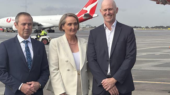 Qantas and Perth Airport have today reached an historic commercial agreement which will unlock a multi-billion-dollar wave of investment and deliver new international and domestic flights, giving a major boost to Australia’s tourism industry. As part of the 12-year agreement, Perth Airport will invest around $3 billion in new terminal facilities and a new parallel runway which will generate immediate and ongoing economic growth and job creation. L-R  WA Premier Roger Cook, Qantas CEO Vanessa Hudson and Perth Airport CEO Jason Waters. Picture: Emma Kirk