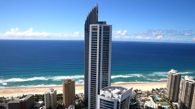 Super powers for the place of super towers — Surfers Paradise gets an average of 53,000 visitors through a day. Photo: David Clark