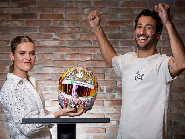 Daniel Ricciardo and his newly designed race helmet by Victorian arts student Rosie Pettenon. Picture: Jake Nowakowski