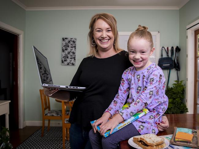 Guilford Young teacher Sarah Banks with her daughter Brydie Peckham 6 who goes to Lindisfarne North Primary. Sarah will juggle teaching from home in term 2 while also supervising Brydie's learningPicture: LUKE BOWDEN