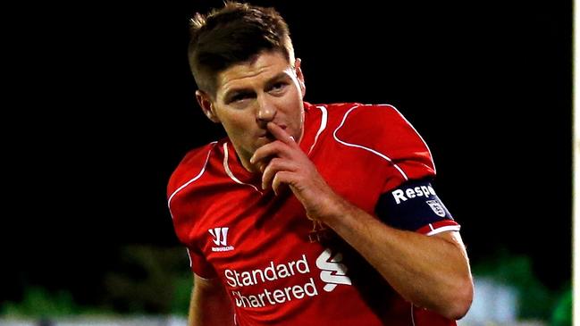 KINGSTON UPON THAMES, ENGLAND - JANUARY 05: Steven Gerrard of Liverpool celebrates after scoring the opening goal with a header during the FA Cup Third Round match between AFC Wimbledon and Liverpool at The Cherry Red Records Stadium on January 5, 2015 in Kingston upon Thames, England. (Photo by Julian Finney/Getty Images)