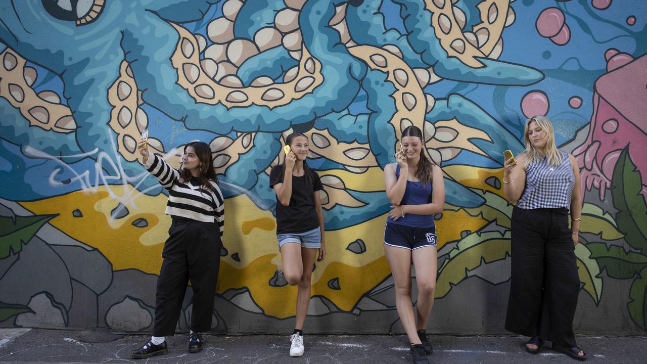 Generation Z and Alpha are the first two “smartphone” cohorts in human history – but are these devices so smart for a healthy, happy adolescence? From left, Talara, Daisy, 13, Leonie, 14, and Ruby, signed up for two weeks on a dumbphone. Picture: Brett Hartwig