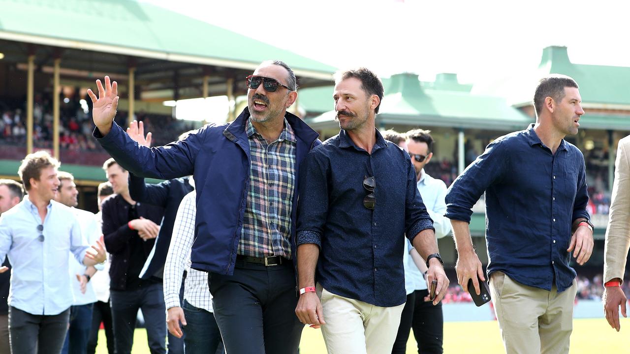 Adam Goodes and Nick Malceski walk the lap of honour at the SCG. (Photo: Phil Hillyard )