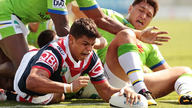 Latrell Mitchell of the Roosters scores a try against Canberra. Picture: Getty Images