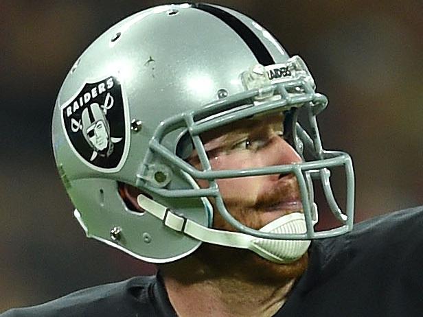 Oakland Raiders' Matt McGloin passes the ball during the NFL football game against Miami Dolphins at Wembley Stadium in London, Sunday, Sept. 28, 2014. (AP Photo/Tim Ireland)