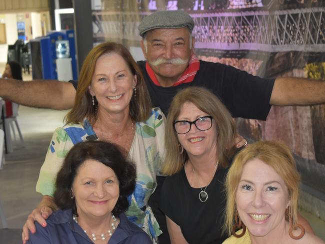 Trish, Loretta, Coral and Jill from Maryborough, with a photobomber at the Italian long lunch, February 25, 2024.