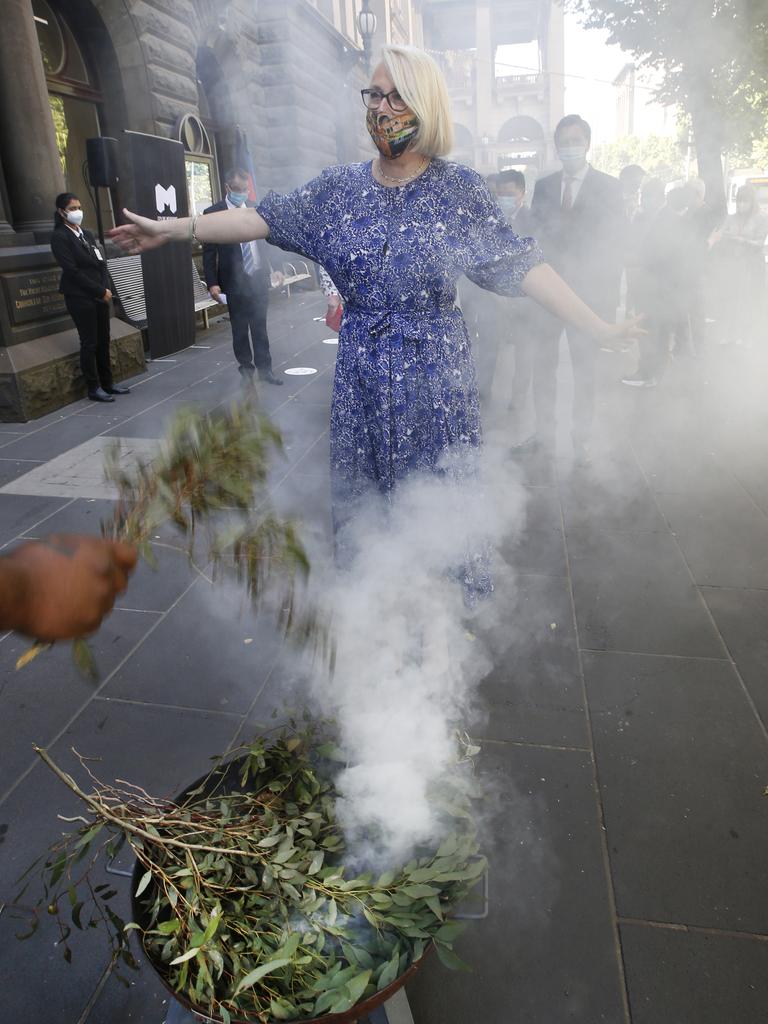 Lord Mayor Sally Capp walks through the smoking ceremony outside before being sworn in at Town Hall. Picture: David Caird