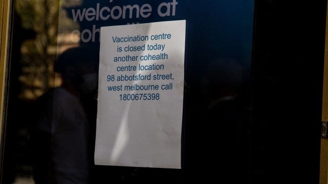 A sign is seen advising visitors of the temporary closure of the Cohealth Melbourne Town Hall vaccination centre due to a planned protest on Thursday. Picture: Getty Images
