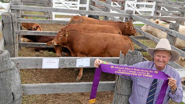 Bill Gross with the ribbon for his champion pen of three prime cattle at the Warwick Show. Picture: Sonja Koremans