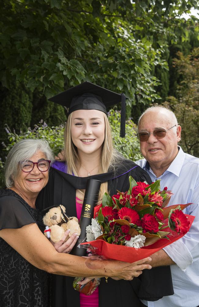 Bachelor of Laws graduate Brianna Wooller with her grandparents Dahlia and Frank Da Costa who timed their visit from Portugal to be there for Brianna's UniSQ graduation ceremony at Empire Theatres, Wednesday, February 14, 2024. Picture: Kevin Farmer