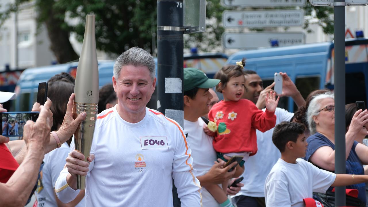 While Nine newspapers voted to go on strike, Mike Sneesby was carrying the flame in Paris.