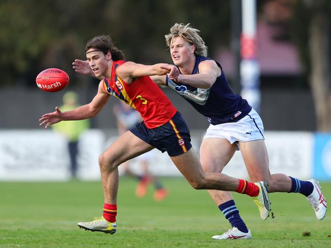 Ben Camporeale and Josh Smillie of contest for the ball during the National Championships. Picture: Sarah Reed/AFL Photos via Getty Images.