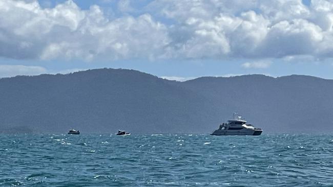 Police Boat Damian Leeding is helping in the search for four missing Aussies after a military helicopter crash in the Whitsundays.