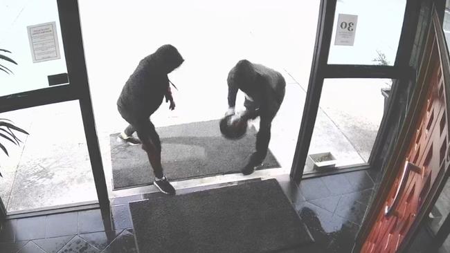 Stills from CCTV footage of the alleged arson at Silks on Upton. Picture: Handout via NCA NewsWire