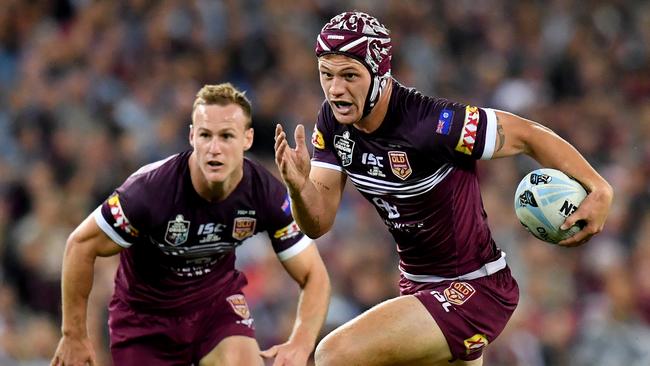 Daly Cherry-Evans (left) and Kalyn Ponga (right) of the Maroons are seen during Game 1 of the 2019 State of Origin series between the Queensland Maroons and the New South Wales Blues at Suncorp Stadium in Brisbane, Wednesday, June 5, 2019. (AAP Image/Darren England) NO ARCHIVING, EDITORIAL USE ONLY