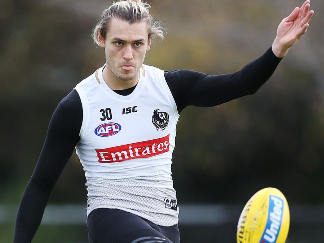 MELBOURNE, AUSTRALIA - JUNE 06: Darcy Moore of the Magpies kicks the ball during a Collingwood Magpies AFL training session at The Holden Centre on June 06, 2019 in Melbourne, Australia. (Photo by Michael Dodge/Getty Images)