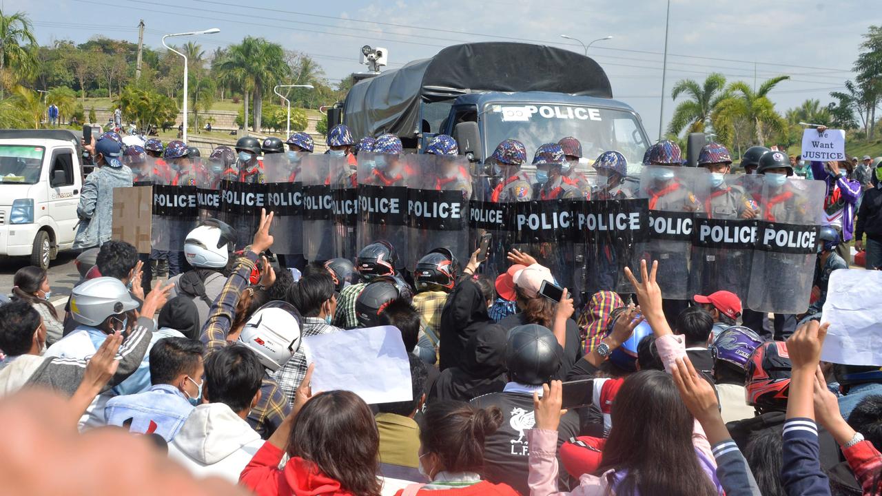 Protesters face off with a phalanx of riot police during the third day of demonstrations against the military coup in Naypyidaw on February 8. Picture: STR / AFP