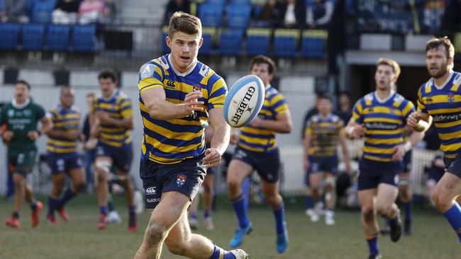 Action in the match between Sydney University and Randwick.