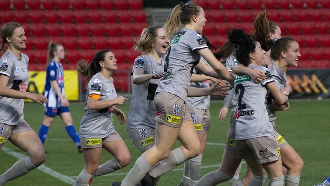 Adelaide City players celebrate after Isabel Hodgson scored a goal in the 2019 WNPL grand final win. Picture: Emma Brasier