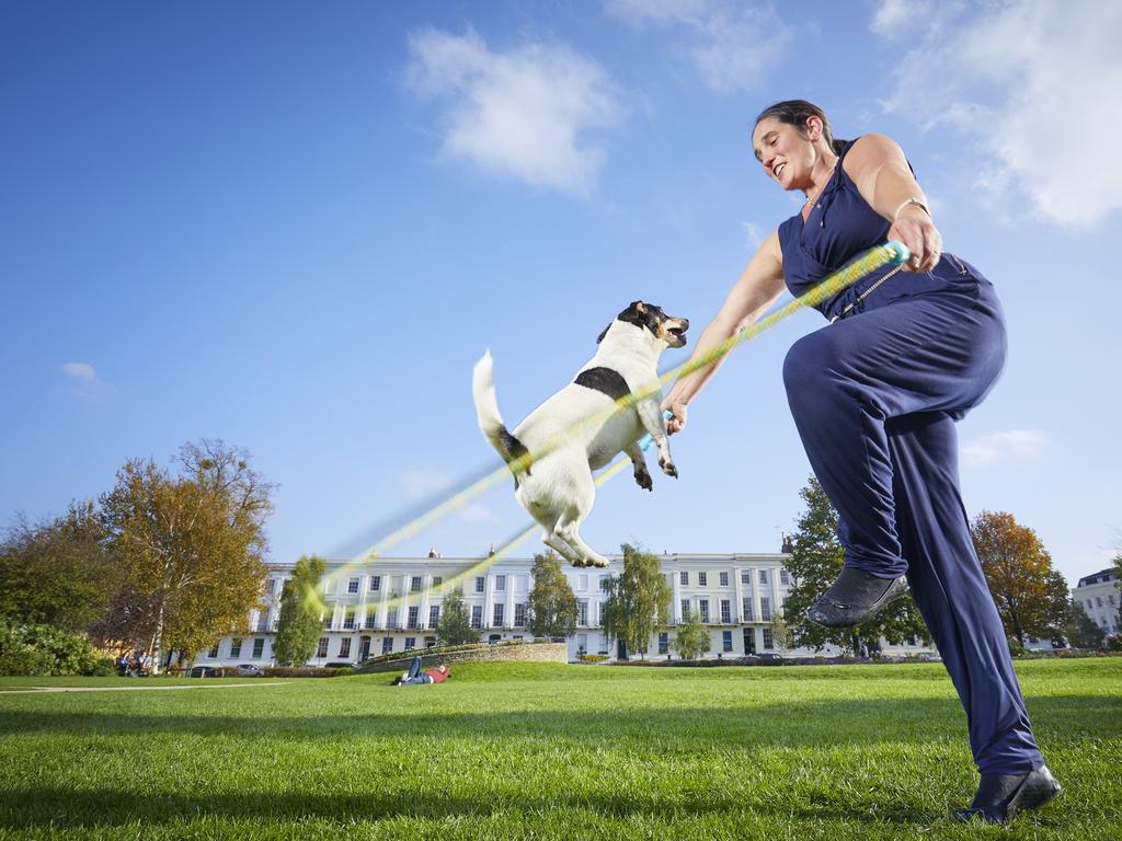 Jessica the Jack Russell and Rachael Grylls - Most skips by a dog and person in 1m. Picture: Paul Michael Hughes/Guinness World Records