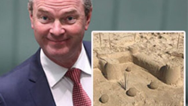 Christopher Pyne and his sandcastle.