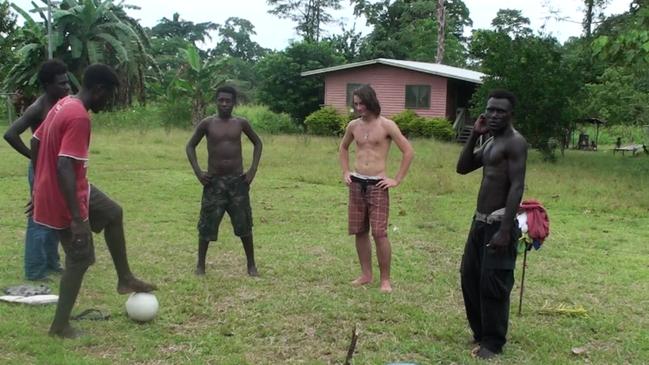 Adrian bonded with locals over their mutual love of soccer. Picture: Adrian Fowler/ Supplied