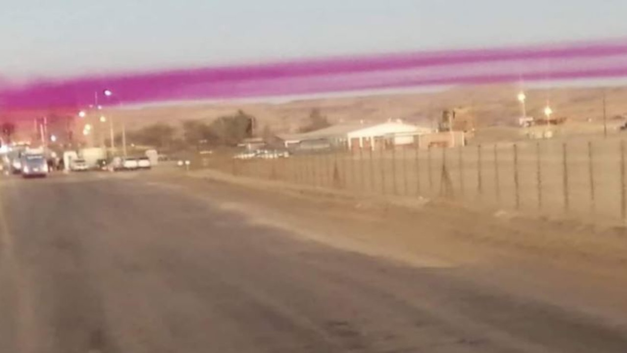 Mystery surrounds bizarre purple cloud. Picture: @JeannetteQuim/Twitter.