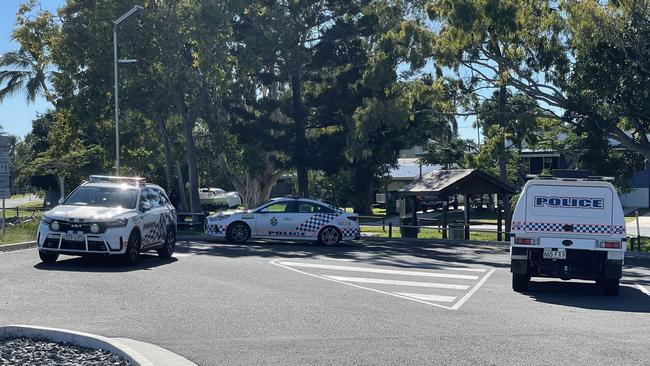 Three police vehicles attended Swan Street Park in Slade Point after it was reported a vehicle was stuck in the ocean. Photo: Fergus Gregg